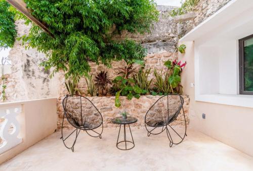 Foto de una habitación de Hotel Colonial Zaci by GuruHotel