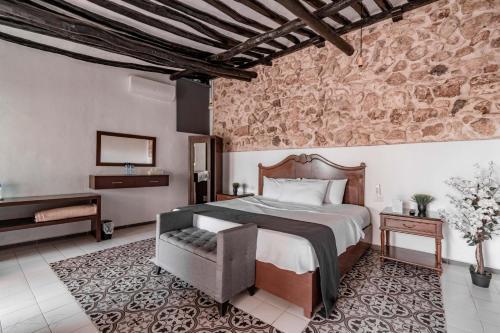 Foto de una habitación de Hotel Colonial Zaci by GuruHotel