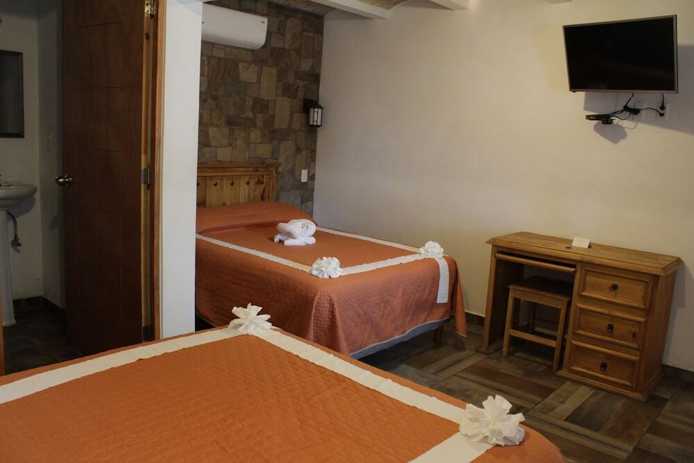 Foto de una habitación de Hotel Venados Inn