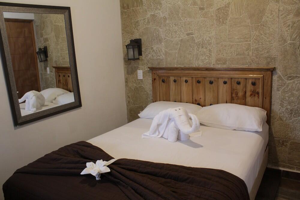 Foto de una habitación de Hotel Venados Inn