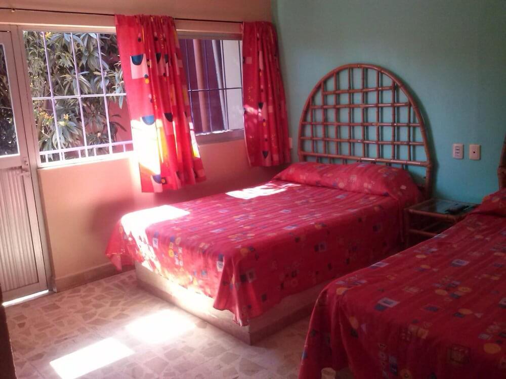 Foto de una habitación de Hotel Angela Carolina