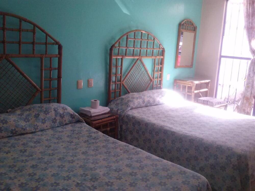 Foto de una habitación de Hotel Angela Carolina