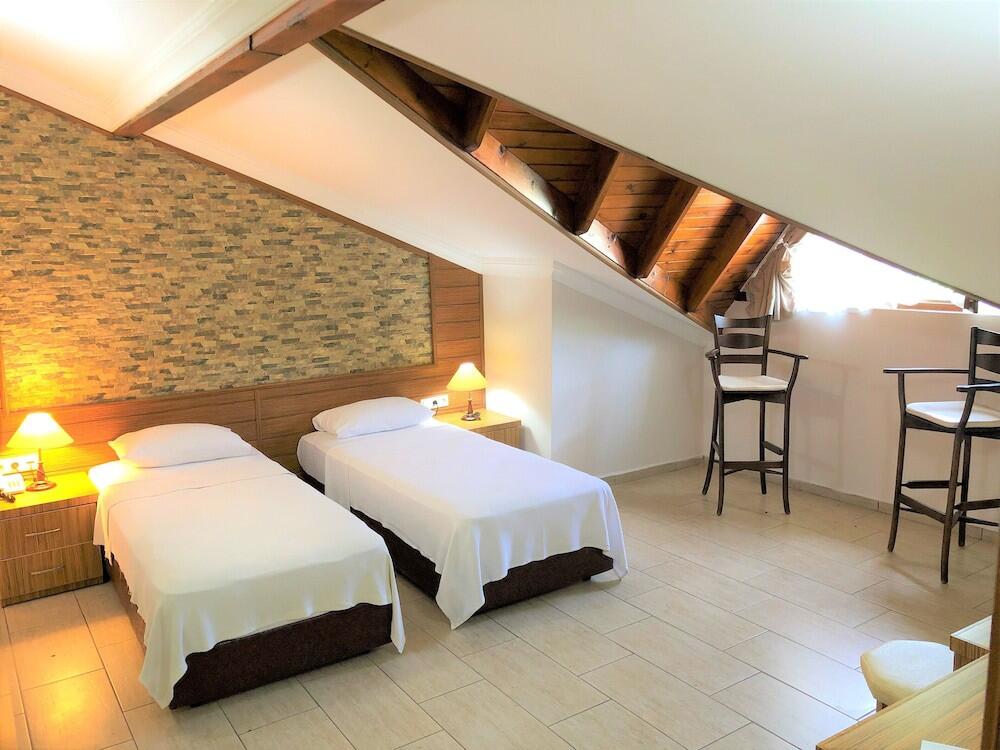 Foto de una habitación de Mesken Inn Hotel