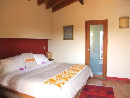 Foto de una habitación de Hotel Las Luciernagas (Adults Only)
