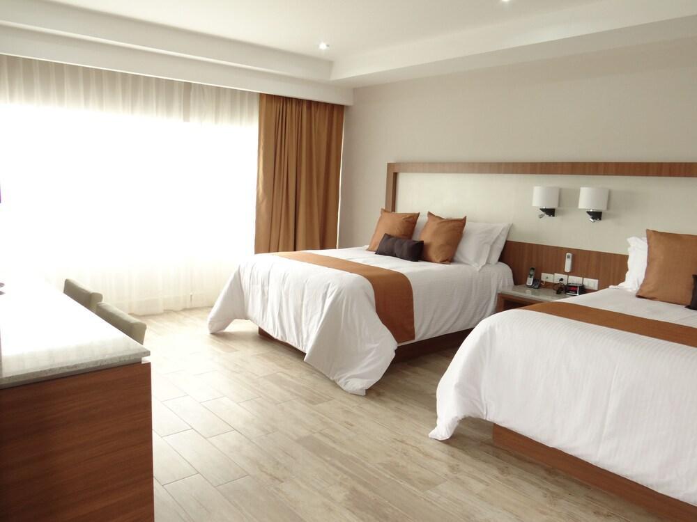 Foto de una habitación de Hotel Soleil Business Class