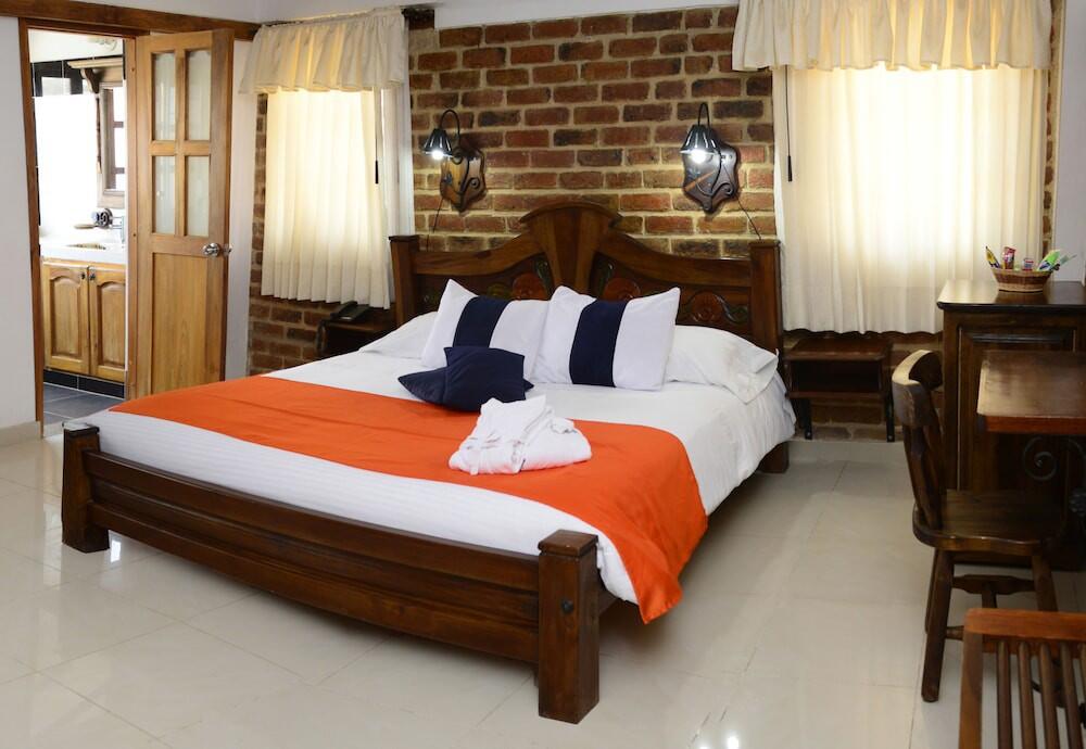 Foto de una habitación de Hotel Boutique Villa Roma