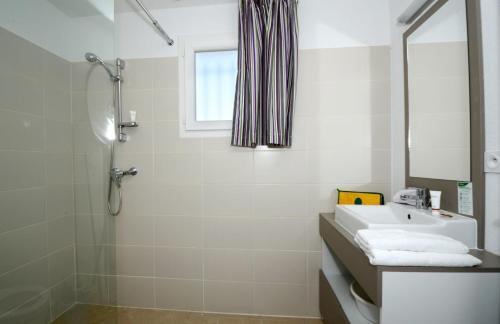 Foto del baño de Résidence Odalys Le Mas des Alpilles
