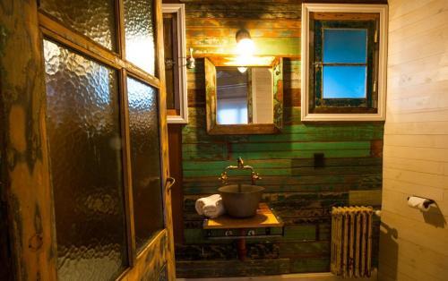 Foto del baño de Aparthotel Departamentos de El Mercado