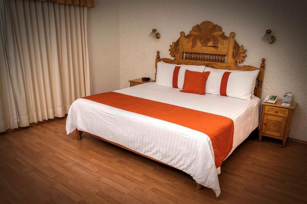 Foto de una habitación de Hotel Del Angel