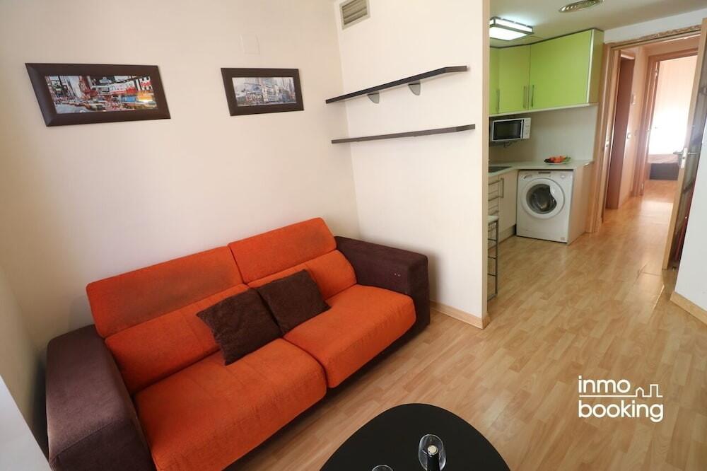 Foto de una habitación de InmoBooking Disseny Apartments