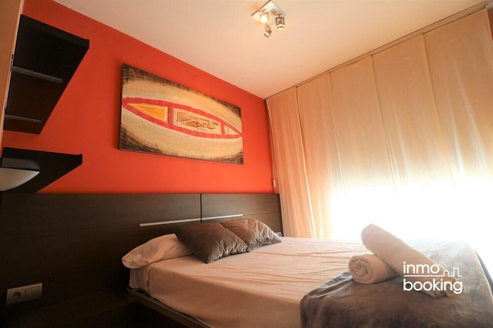 Foto de una habitación de InmoBooking Disseny Apartments