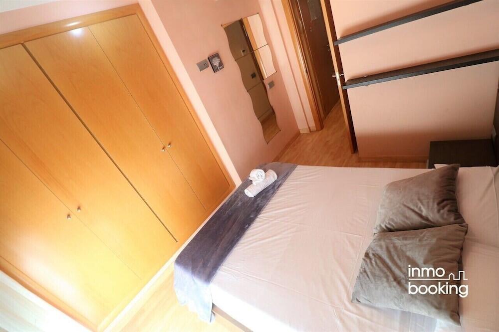 Foto de una habitación de InmoBooking Disseny Apartments