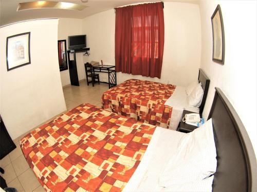 Foto de una habitación de Hotel Jorge Alejandro