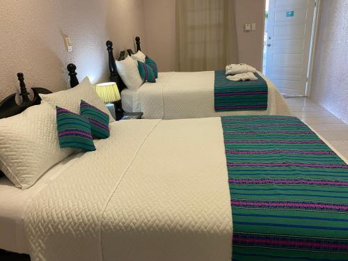 Foto de una habitación de Hotel La Isla Resort