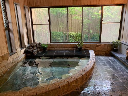 Foto de una habitación de Onsen &amp;amp; Garden -Asante Inn-