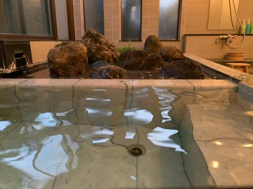 Foto de una habitación de Onsen &amp;amp; Garden -Asante Inn-