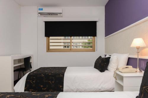 Foto de una habitación de Santiago Hotel