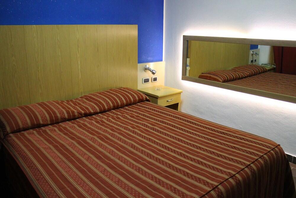 Foto de una habitación de Orange Motel