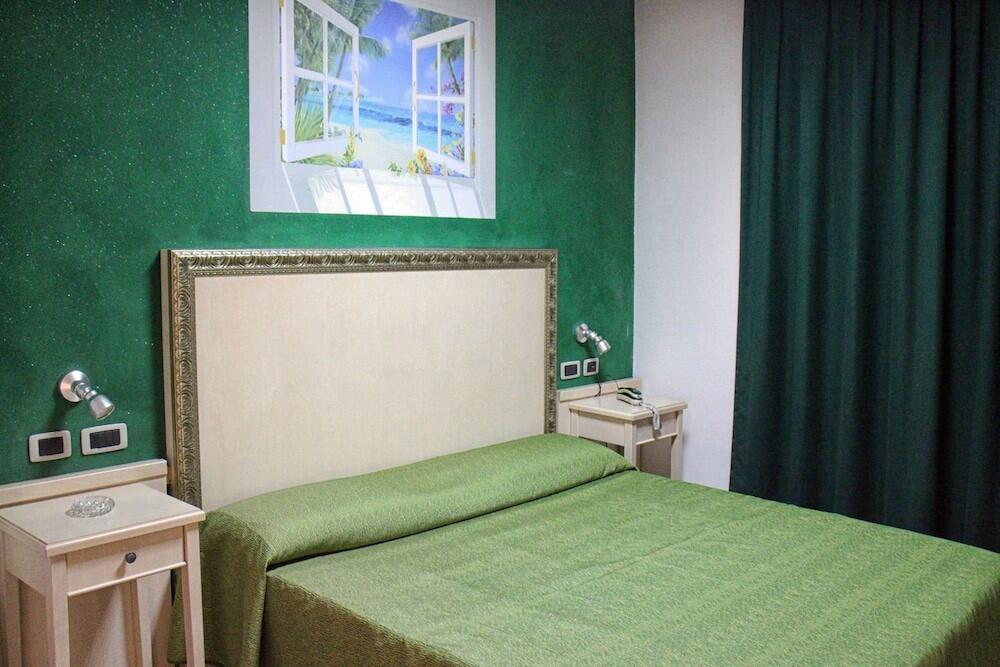 Foto de una habitación de Orange Motel