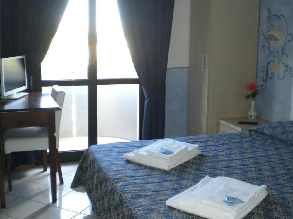 Foto de una habitación de Hotel Romagna