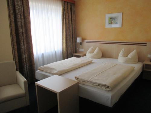 Foto de una habitación de Hotel Apollo Garni