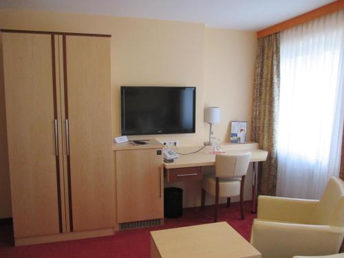 Foto de una habitación de Hotel Apollo Garni
