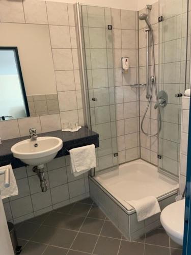 Foto del baño de Hotel Apollo Garni
