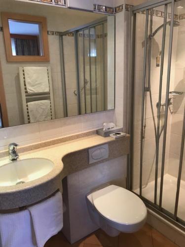 Foto del baño de Hotel Apollo Garni