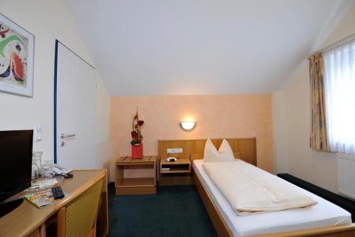 Foto de una habitación de Hotel Apollo Garni